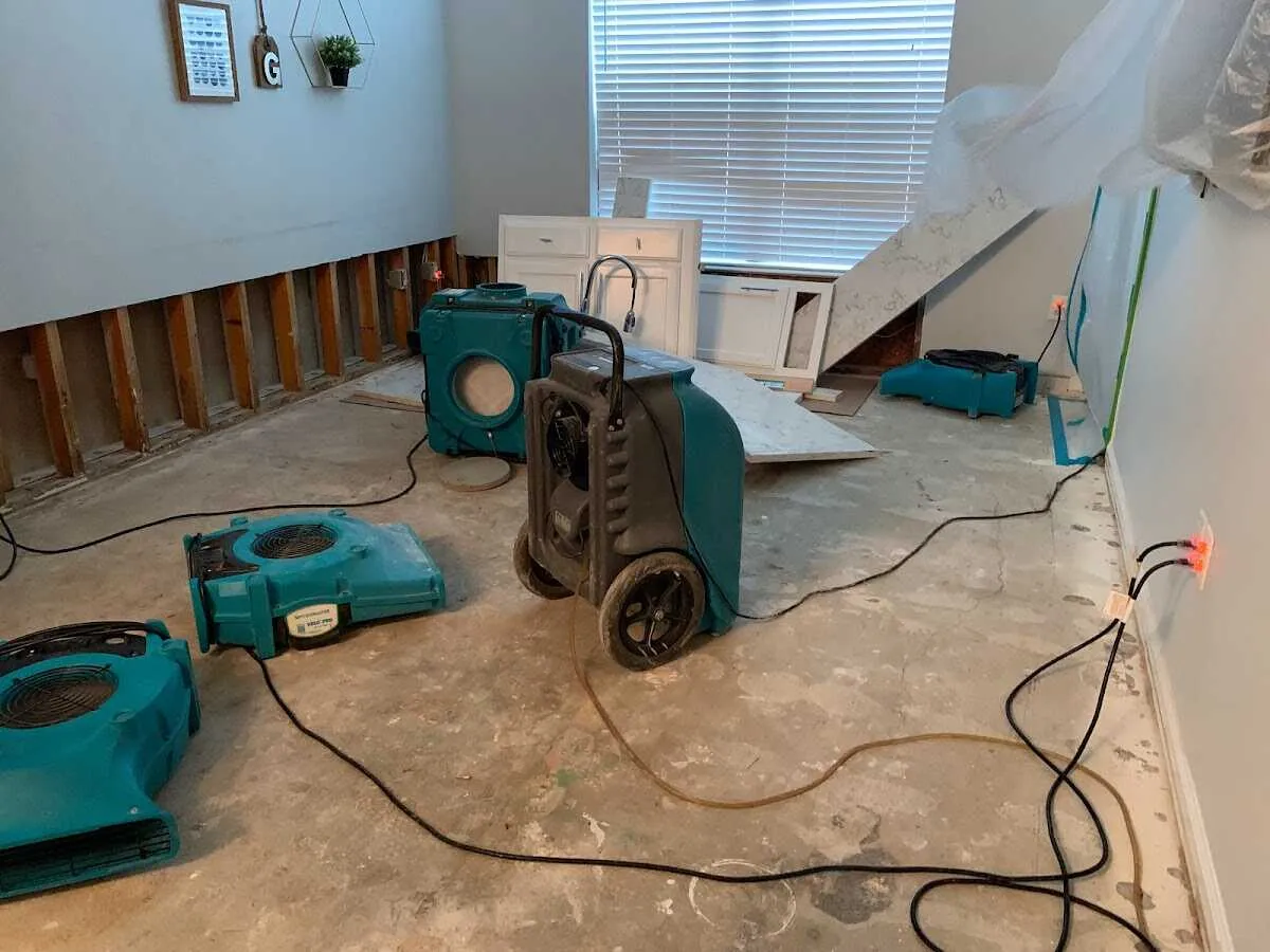 Dehumidifier in flood-cut room for Water Damage Restoration in Port Salerno